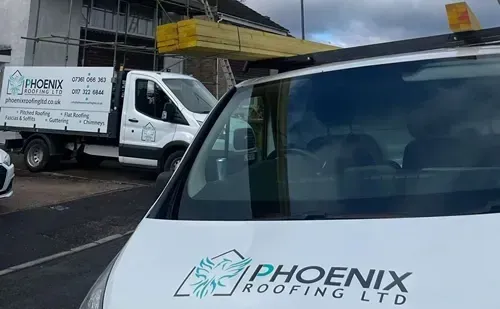 Phoenix Roofing vans arriving on site for an emergency roof repair